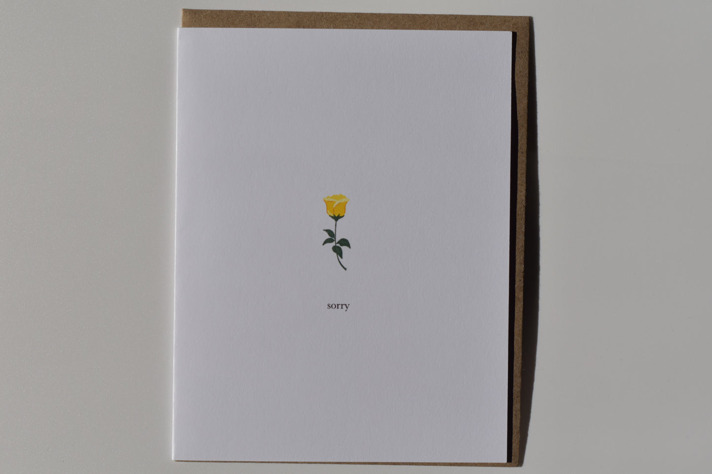 footnotes greeting card - sorry (single rose)